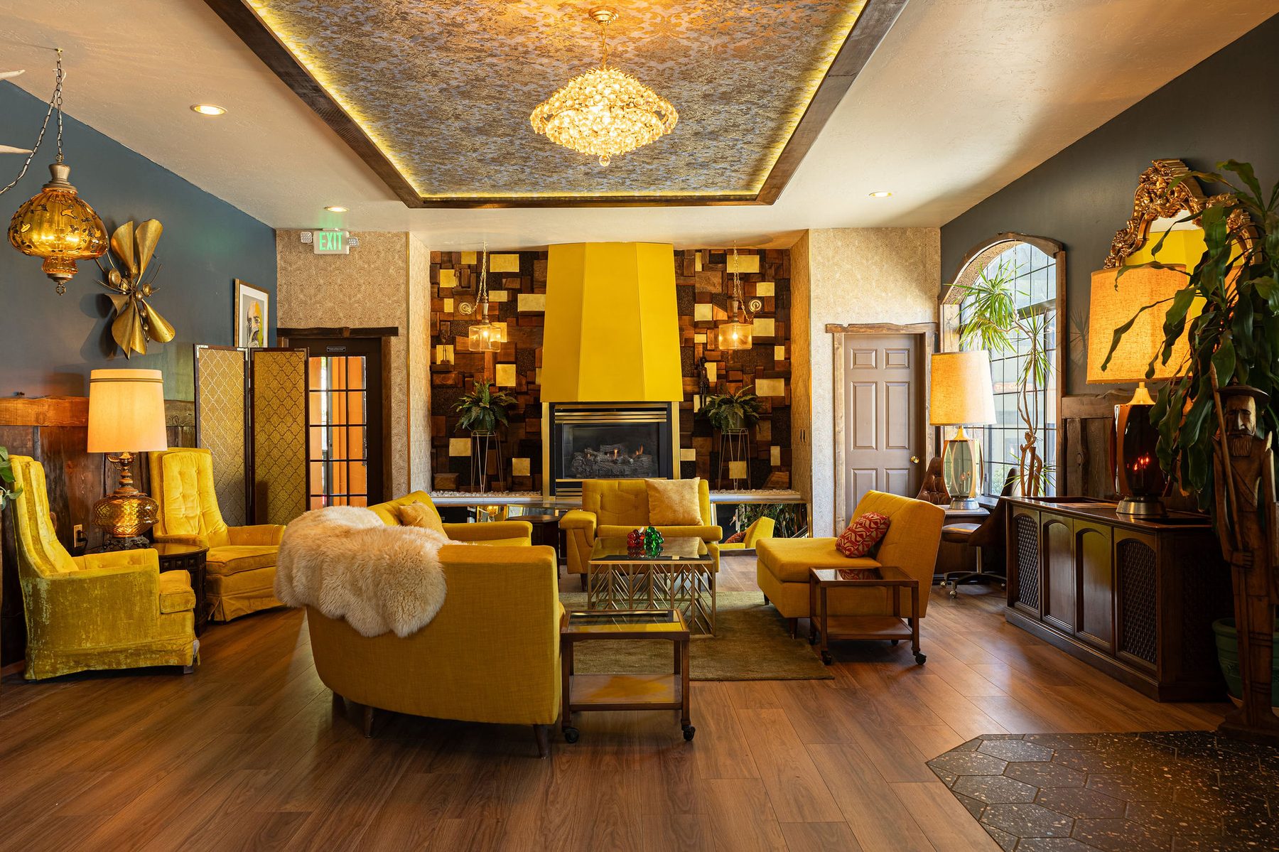 The yellow-fireplace lounge at The Burgundy
